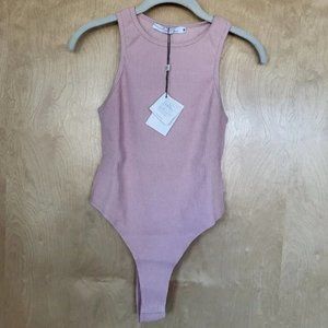 By Egreis Blush Pink Ribbed Bodysuit